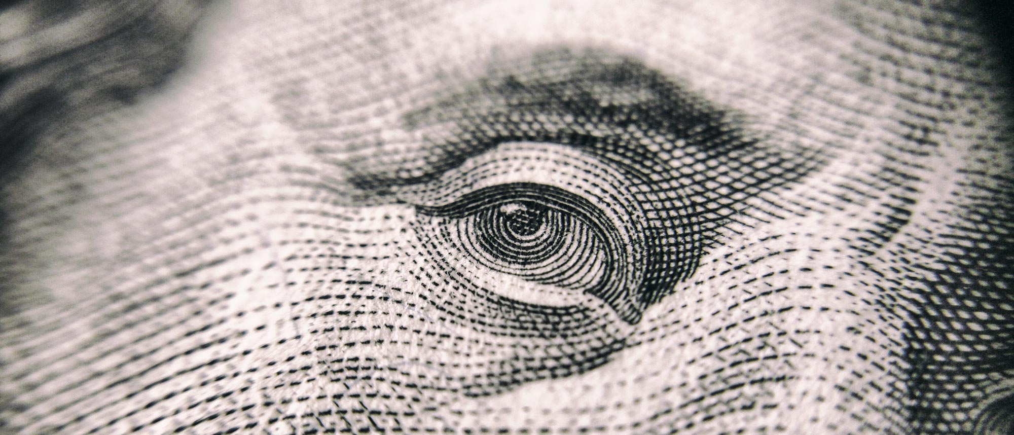the eye of George Washington on the one dollar bill to signify the money you save when you have your debt discharged