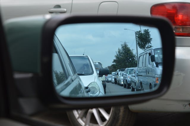 car close in sideview mirror
