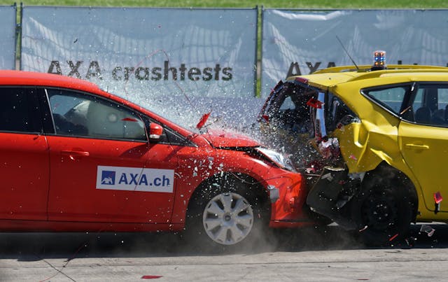 red car crashing into the back of a yellow car